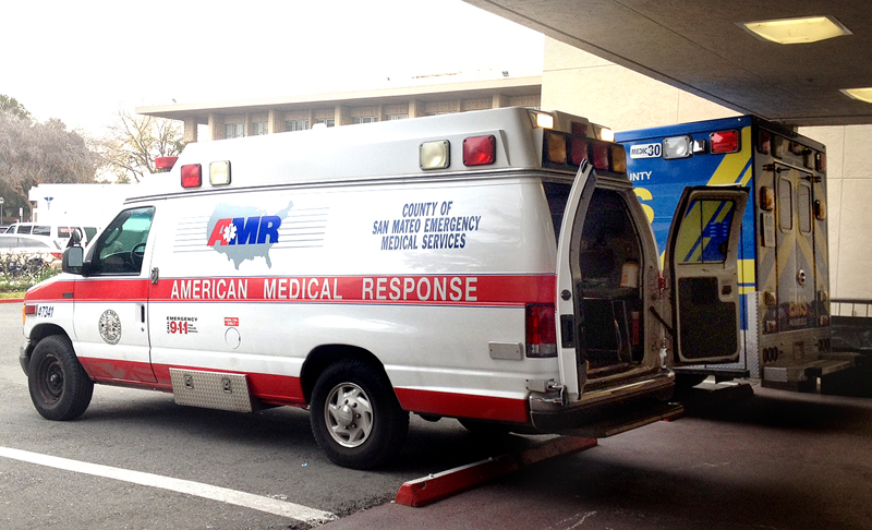 Ambulances from San Mateo and Santa Clara counties sit outside of Stanford Hospital while patients are admitted into the hospital on Jan. 22, 2013.  Photo by Veronica Weber.